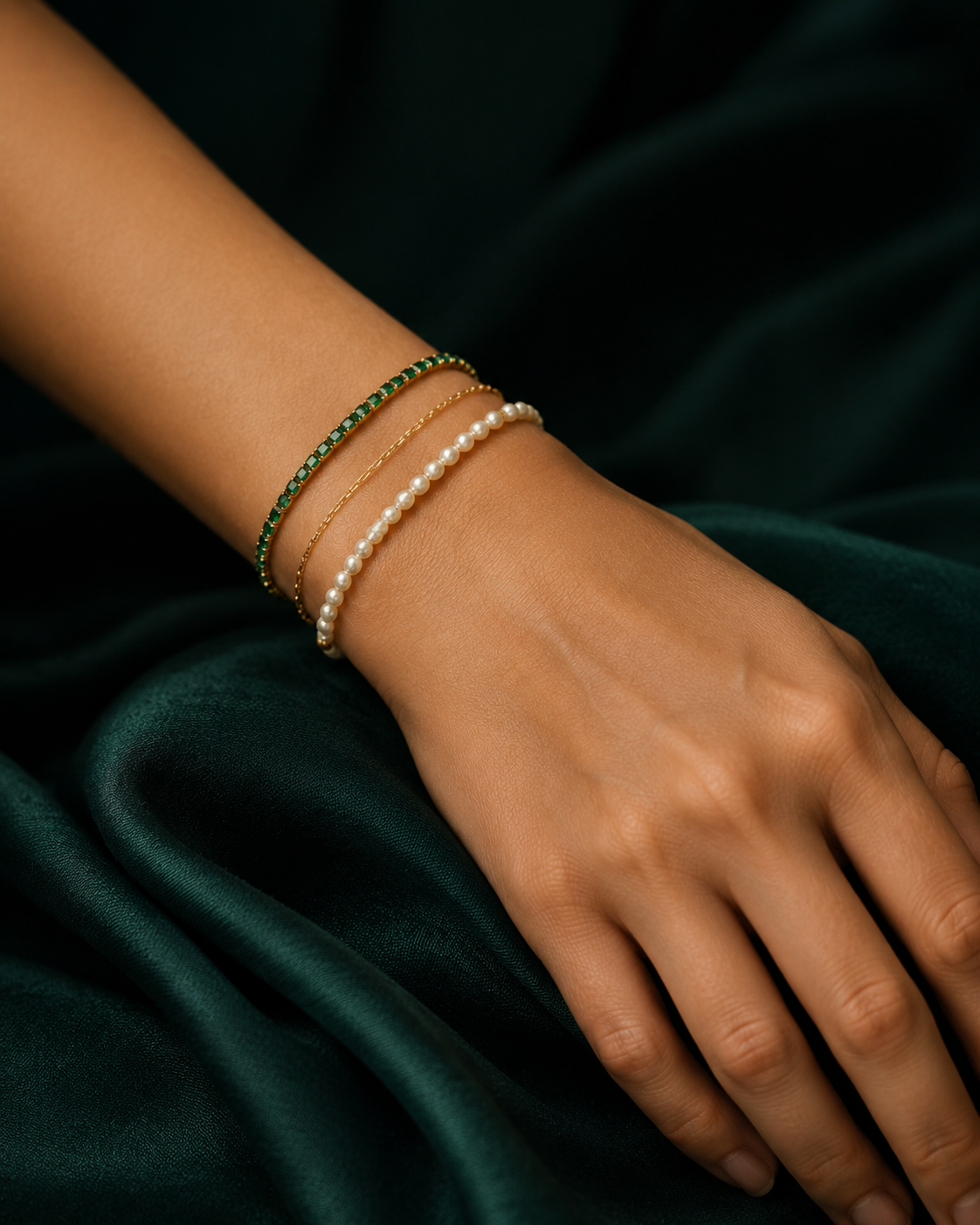 Tennis bracelet stacked with a beaded bracelet