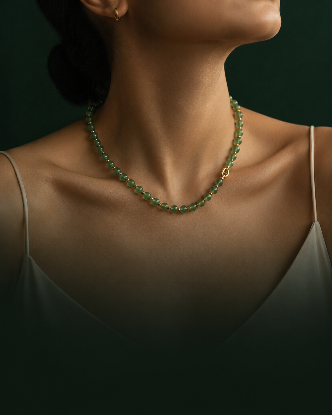 Dainty gold plated necklace worn at the collarbone