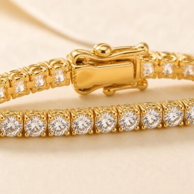 Close-up of 3mm round CZ tennis bracelet in 18K gold-plated finish