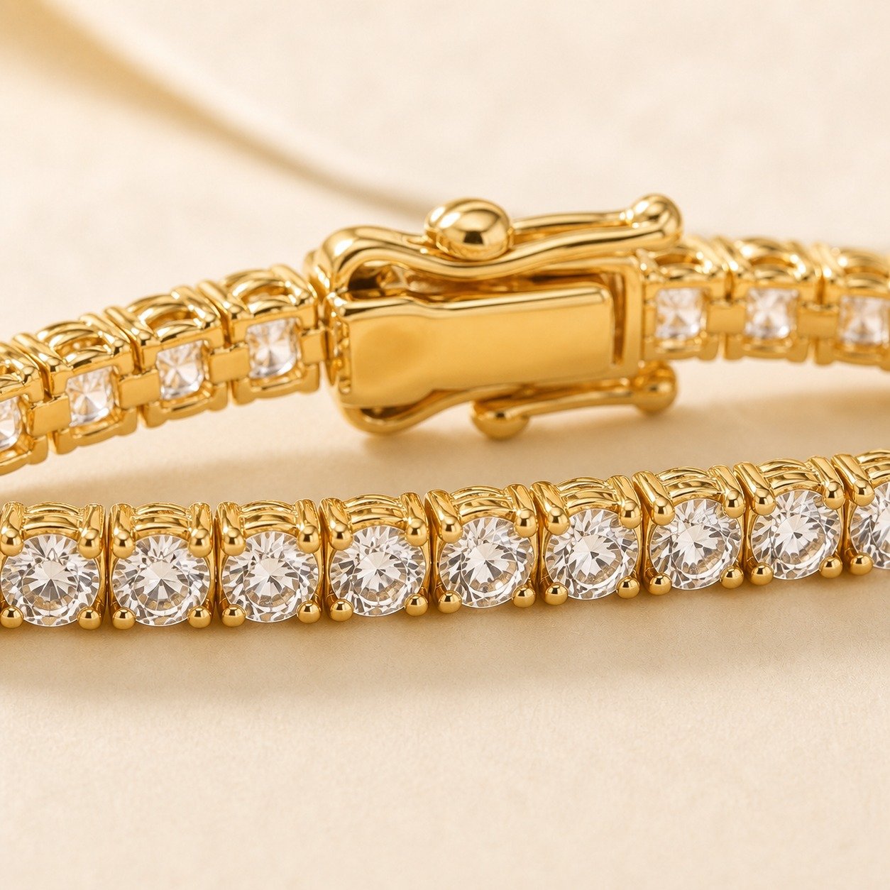 Close-up of 3mm round CZ tennis bracelet in 18K gold-plated finish