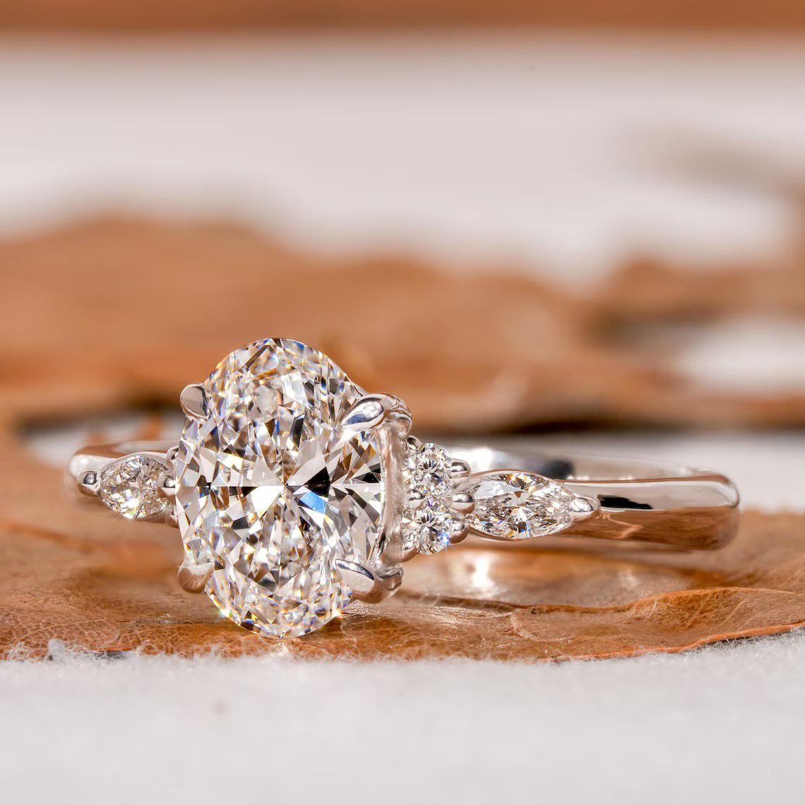 Oval Engagement Ring with Marquise Side Stones – Platinum Color - Image 2