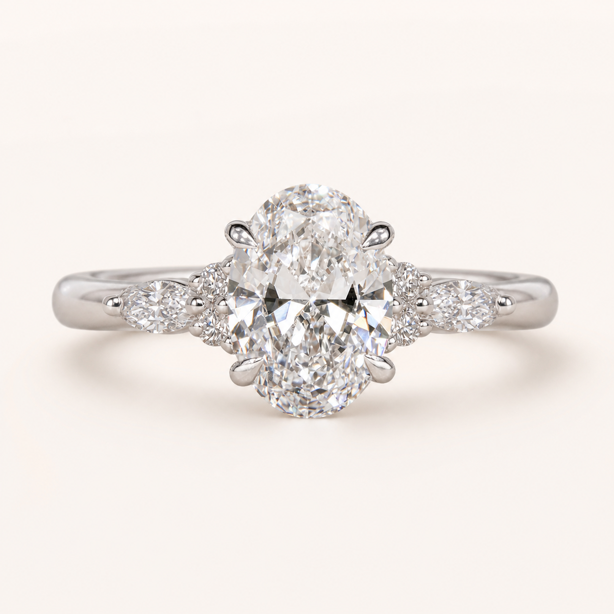 Oval Engagement Ring with Marquise Side Stones – Platinum Color