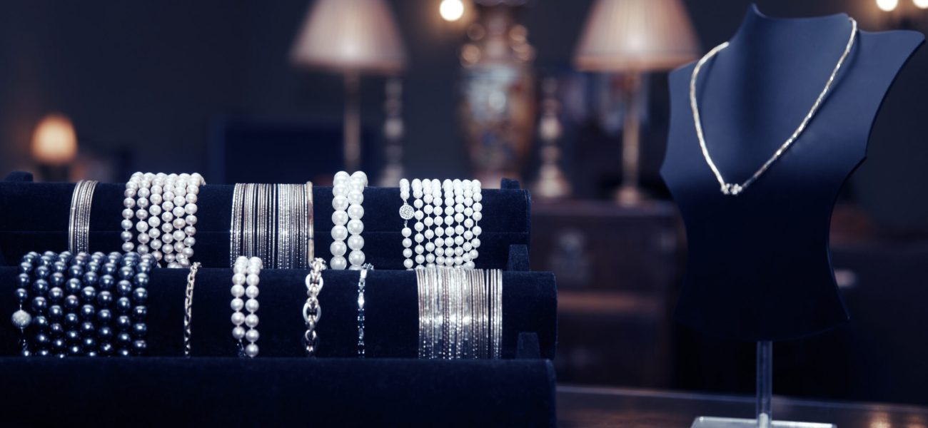 Assortment of jewelry in a jewelry shop. Close-up view